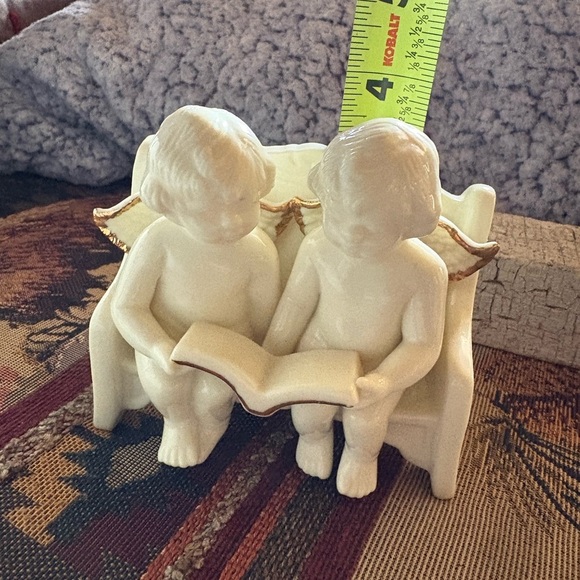 Vintage Porcelain Angel Figurine Two
Angels Sitting On a Bench - Picture 11 of 12